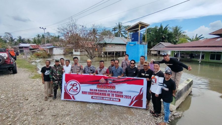 GANDENG KOMUNITAS OFFROAD, KAPOLRES LUWU UTARA TERJANG BANJIR SALURKAN BANTUAN BAGI WARGA