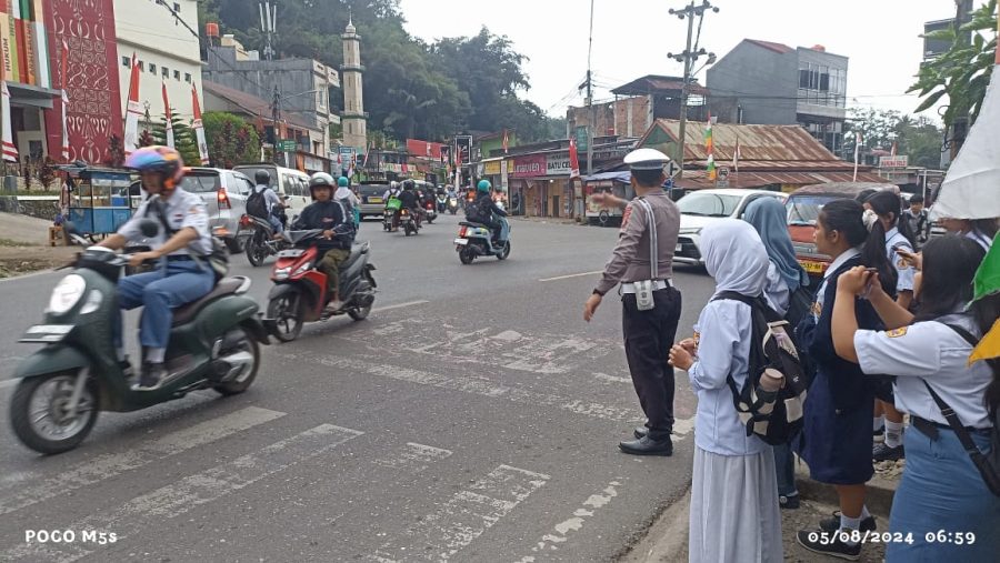 *Lancarkan Aktivitas Masyarakat, Satlantas Polres Tator Laksanakan Gatur Lalin*