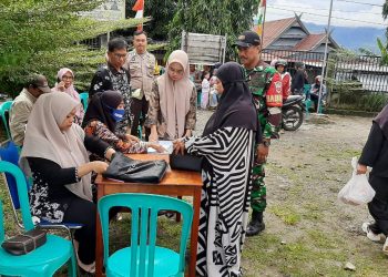 Bhabinkamtibmas dan Babinsa Bacukiki Dampingi Operasi Pasar Murah Paket Ramadhan
